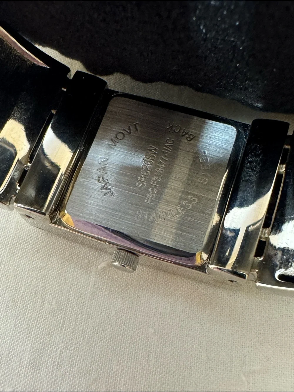 Avon Silver Tone Rectangular Face Watch with Green Accent Links